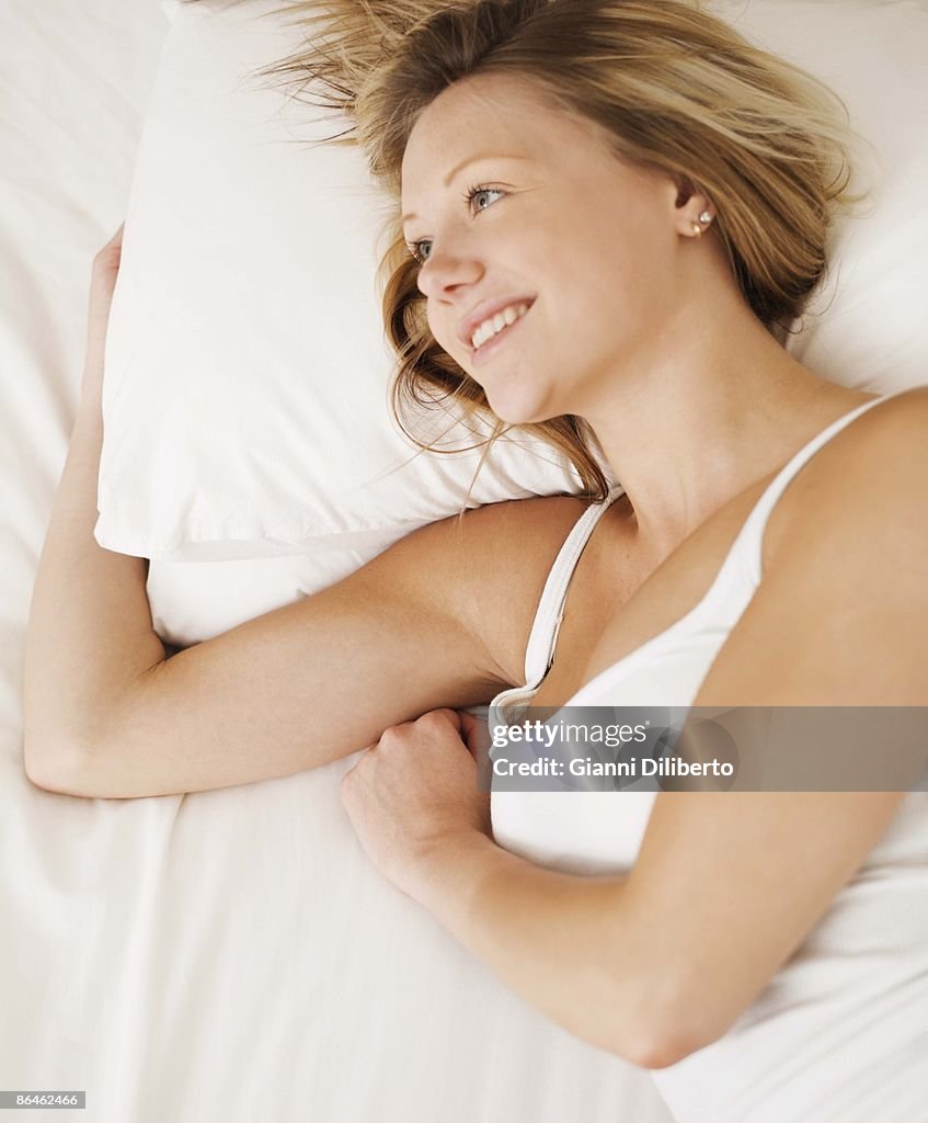 Teenage girl in bed