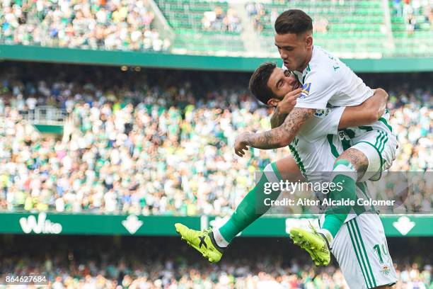 Arnaldo Antonio Sanabria of Real Betis Balompie ceebrates after scoring the first goal for Real Betis Balompie with Antonio Barragan of Real Betis...