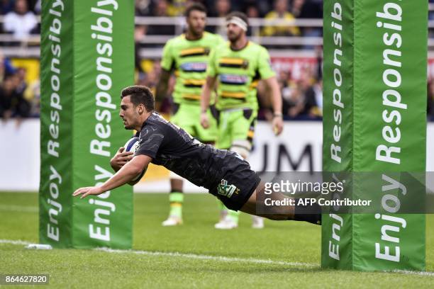Clermont's French scrum-half Charlie Cassang scores a try during the European Rugby Champions Cup match ASM Clermont Auvergne vs Northampton Saints...