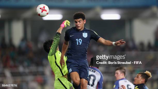 Morgan Gibbs White of England jumps for a header during the FIFA U-17 World Cup India 2017 Quarter Final match between USA and England at Pandit...