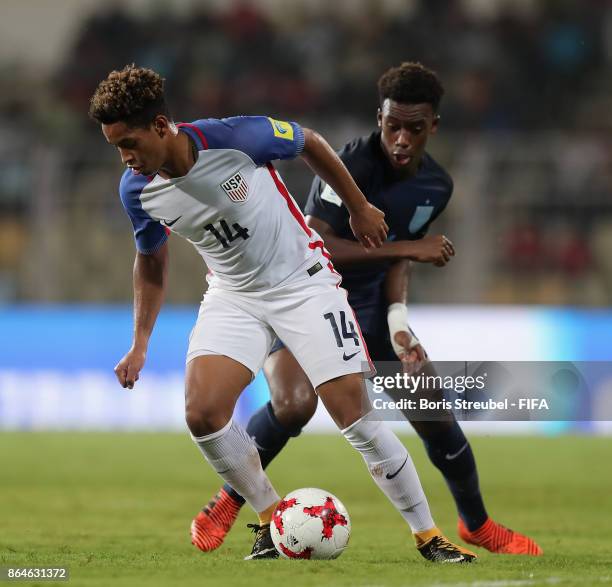 Akil Watts of the United States battles for the ball with Callum Hudson-Odoi of England during the FIFA U-17 World Cup India 2017 Quarter Final match...
