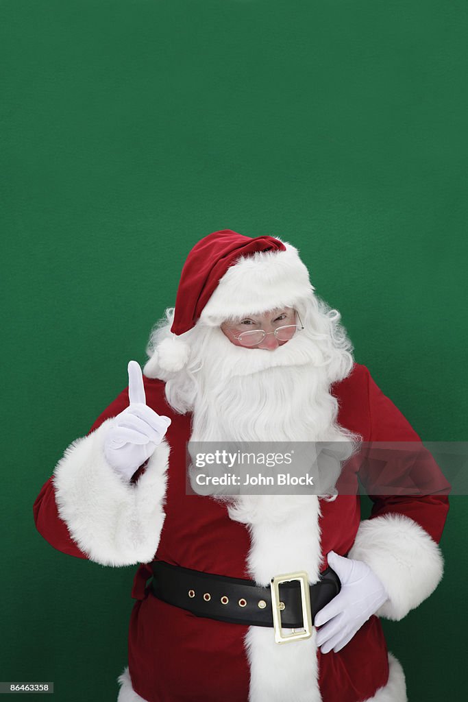 Santa claus giving hang gesture