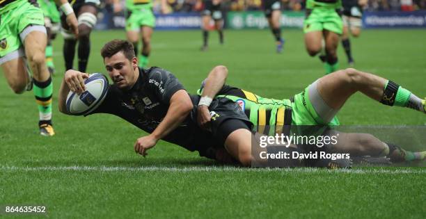 Charlie Cassang of Clermont Auvergen dives over for their third try during the European Rugby Champions Cup match between ASM Clermont Auvergne and...