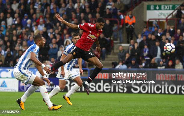 Marcus Rashford of Manchester United scores the first Manchester United goal during the Premier League match between Huddersfield Town and Manchester...