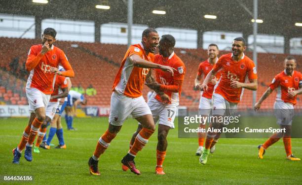 Blackpool's Kyle Vassell celebrates scoring his side's first goal with teammates during the Sky Bet League One match between Blackpool and Wigan...