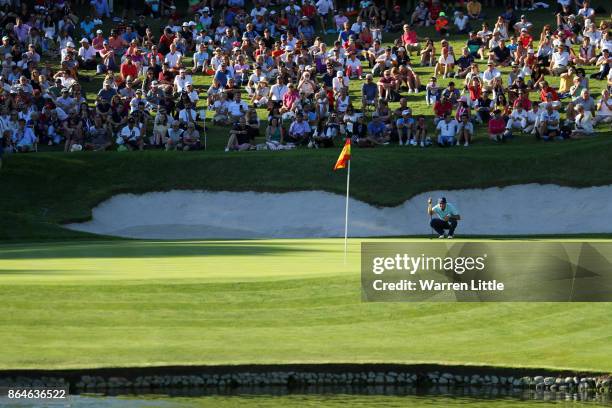 Sergio Garcia of Spain lines up a putt on the 17th green during day three of the Andalucia Valderrama Masters at Real Club Valderrama on October 21,...