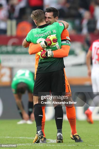 Niclas Fuellkrug of Hannover and Philipp Tschauner of Hannover celebrate after the Bundesliga match between FC Augsburg and Hannover 96 at WWK-Arena...