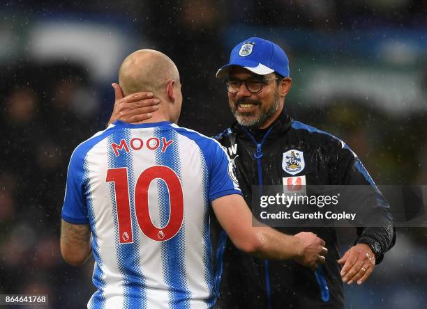 Aaron Mooy of Huddersfield Town and David Wagner, Manager of Huddersfield Town celebrate victory after the Premier League match between Huddersfield...