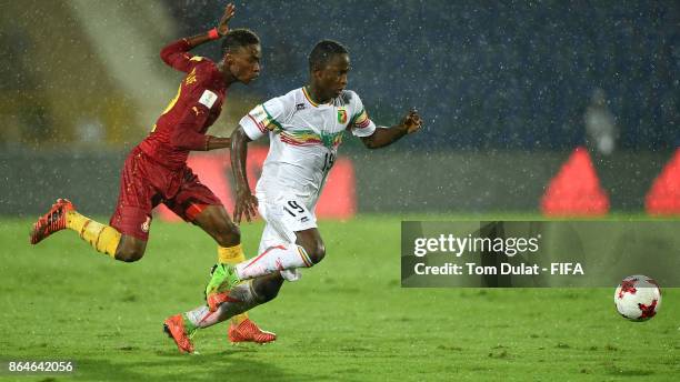 Lassana Ndiaye of Mali and Abdul Yusif of Ghana in action during the FIFA U-17 World Cup India 2017 Quarter Final match between Mali and Ghana at...