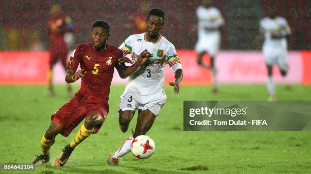 Djemoussa Traore of Mali and Najeeb Yakubu of Ghana in action during the FIFA U-17 World Cup India 2017 Quarter Final match between Mali and Ghana at...