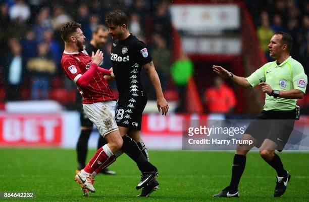 Matt Taylor of Bristol City and Gaetano Berardi of Leeds United clash resulting in red cards for both during the Sky Bet Championship match between...