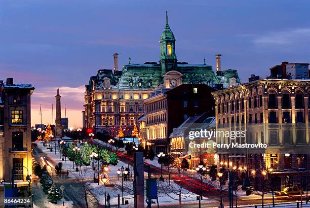 place jacques cartier on a winter night, old montreal, quebec, canada - vieux montréal stock-fotos und bilder