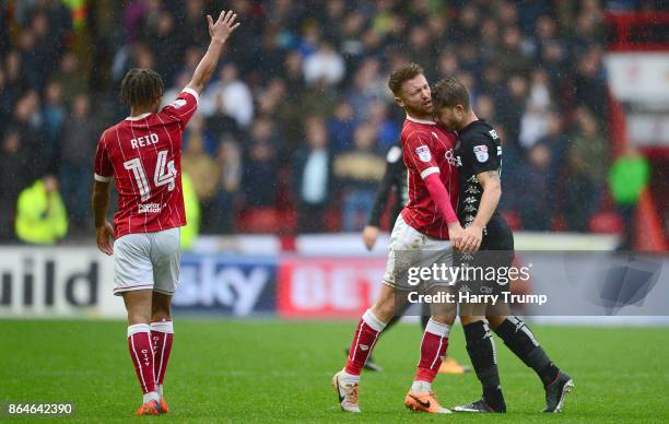 Matt Taylor of Bristol City and Gaetano Berardi of Leeds United clash resulting in red cards for both during the Sky Bet Championship match between...