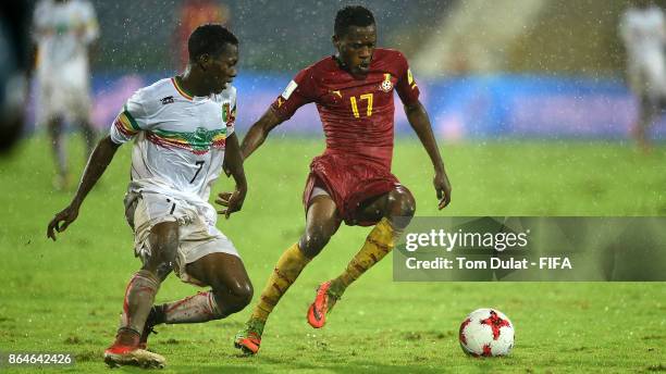 Hadji Drame of Mali and Rashid Alhassan of Ghana in action during the FIFA U-17 World Cup India 2017 Quarter Final match between Mali and Ghana at...