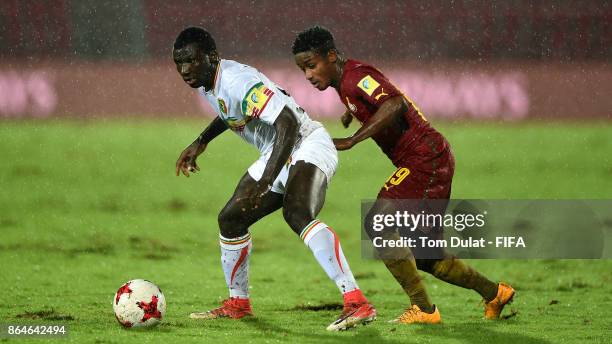 Seme Camara of Mali and Sadiq Ibrahim of Ghana in action during the FIFA U-17 World Cup India 2017 Quarter Final match between Mali and Ghana at...