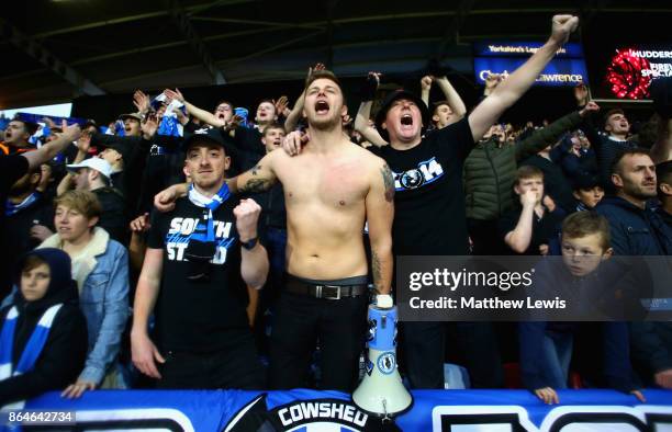 Huddersfield Town fans sing after the Premier League match between Huddersfield Town and Manchester United at John Smith's Stadium on October 21,...