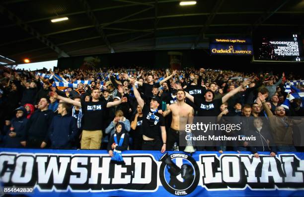 Huddersfield Town fans sing after the Premier League match between Huddersfield Town and Manchester United at John Smith's Stadium on October 21,...