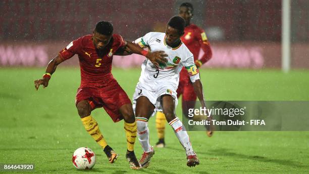 Djemoussa Traore of Mali and Najeeb Yakubu of Ghana in action during the FIFA U-17 World Cup India 2017 Quarter Final match between Mali and Ghana at...