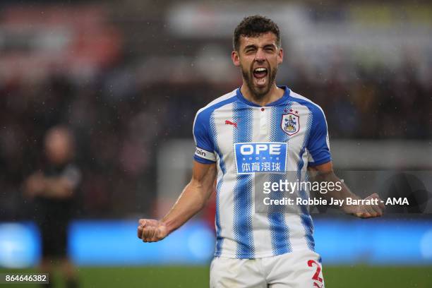 Tommy Smith of Huddersfield Town celebrates at full time during the Premier League match between Huddersfield Town and Manchester United at John...