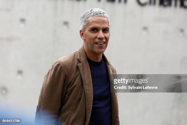 Sami Bouajila attends the shooting of French short black-and-white silent documentary film 'La Sortie de l'Usine' directed by Wong Kar-wai at the...