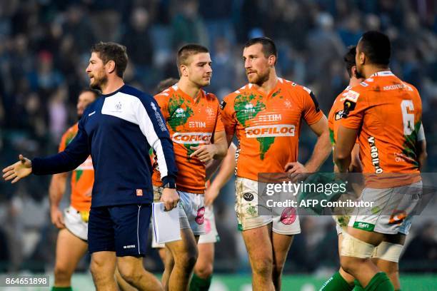 Benetton Treviso's centre Alberto Sgarbi and teammates react after the European Rugby Champions Cup match Benetton Treviso vs RC Toulon at the Monigo...