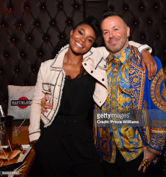 Gabrielle Union and Legendary Damon attend Gabrielle Union's Book Tour After Party at Boogalou Lounge on October 20, 2017 in Atlanta, Georgia.