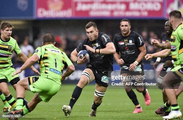 Clermont's French lock Paul Jedrasiak runs with the ball during the European Rugby Champions Cup match ASM Clermont Auvergne vs Northampton Saints at...
