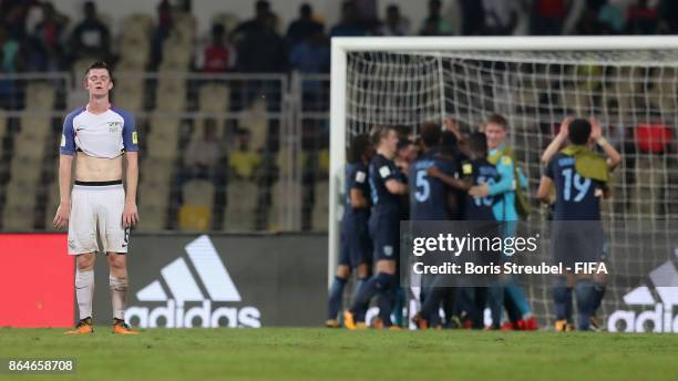 Jonathan Panzo of England reacts after Rhian Brewster of England scores his team's fourth by penalty during the FIFA U-17 World Cup India 2017...