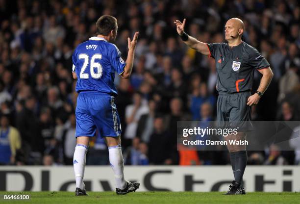 John Terry of Chelsea argues with referee Tom Henning Ovrebo during the UEFA Champions League Semi Final Second Leg match between Chelsea and...