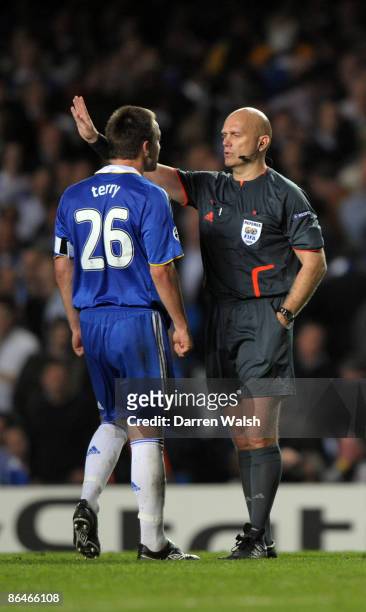John Terry of Chelsea argues with referee Tom Henning Ovrebo during the UEFA Champions League Semi Final Second Leg match between Chelsea and...