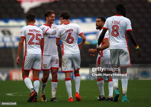 Milton Keynes Dons celebrate Ed Upson's first goal during the Sky Bet League One match between Milton Keynes Dons and Oldham Athletic at StadiumMK on...