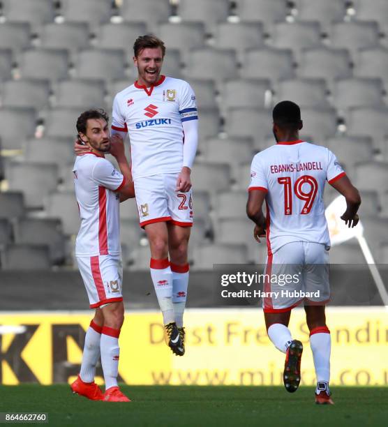 Alex Gilbey of Milton Keynes Dons celebrates scoring his side's first goal during the Sky Bet League One match between Milton Keynes Dons and Oldham...