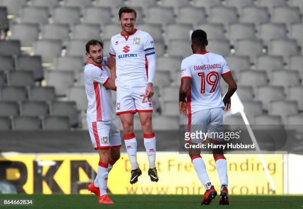 Alex Gilbey of Milton Keynes Dons celebrates scoring his side's first goal during the Sky Bet League One match between Milton Keynes Dons and Oldham...