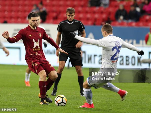 Magomed Ozdoyev FC Rubin Kazan vies for the ball with Aleksei Kozlov FC Dinamo Moscow during the Russian Premier League match between FC Rubin Kazan...
