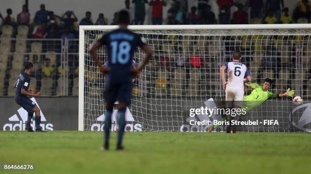 Rhian Brewster of England scores his team's fourth goal and his personal third goal by penalty against goalkeeper Justin Garces of the United States...