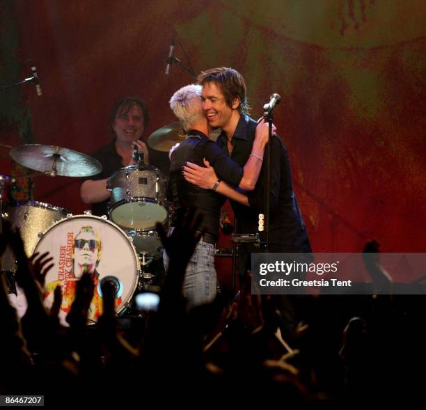 Marie Fredriksson reunites with Roxette member Per Gessle during his concert at Melkweg on May 6, 2009 in Amsterdam, Netherlands.