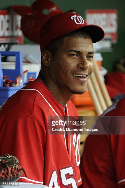 Pitcher Daniel Cabrera of the Washington Nationals smiles in the dugout prior to a game on May 2, 2009 against the St. Louis Cardinals at Nationals...