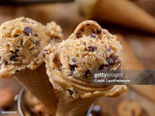 editable chocolate chip cookie dough cone - chocolate chip cookies stock pictures, royalty-free photos & images