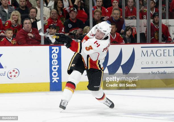Dion Phaneuf of the Calgary Flames shoots the puck during game 5 of the Western Conference Quarterfinals of the 2009 Stanley Cup Playoffs against the...
