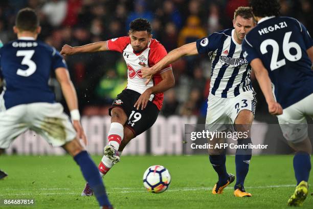 Southampton's Moroccan midfielder Sofiane Boufal shoots to score the opening goal of the English Premier League football match between Southampton...