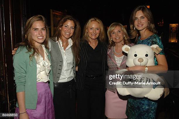 Ashley Bush, Dylan Lauren, Ricky Lauren, Sharon Bush and Lauren Bush attend a Mother's Day tea in celebration of the launch of the FEED bear at The...