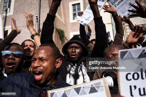 People protest during a national demonstration for refugees civil rights and against the racism, titled 'No one is illegal, migration is not a...