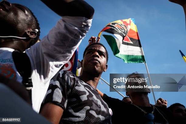 People protest during a national demonstration for refugees civil rights and against the racism, titled 'No one is illegal, migration is not a...