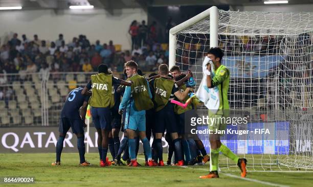 England players celebrate at the final whistle during the FIFA U-17 World Cup India 2017 Quarter Final match between USA and England at Pandit...