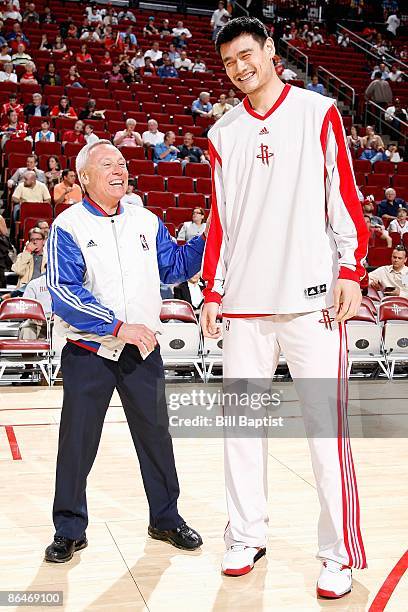 Referee Jimmy Clark shares a laugh with Yao Ming of the Houston Rockets before the game against the New Orleans Hornets on April 13, 2009 at the...