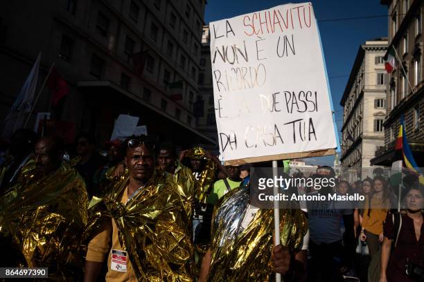 People protest during a national demonstration for refugees civil rights and against the racism, titled 'No one is illegal, migration is not a...