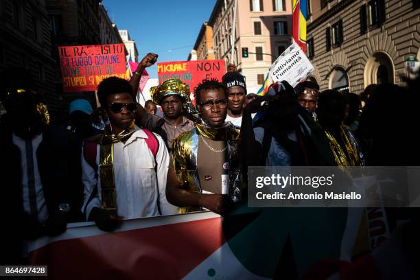 People protest during a national demonstration for refugees civil rights and against the racism, titled 'No one is illegal, migration is not a...