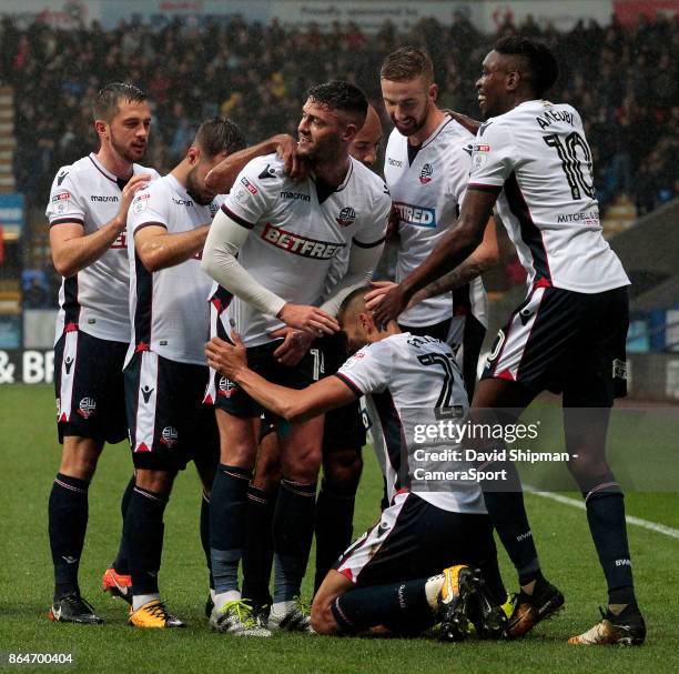 Bolton Wanderers' Darren Pratley is mobbed after scoring his side's first goal during the Sky Bet Championship match between Bolton Wanderers and...