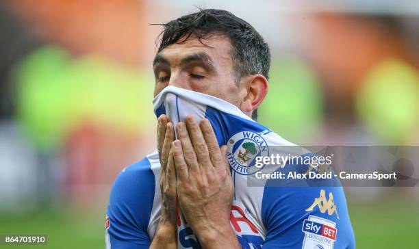 Wigan Athletic's Gary Roberts leaves the field during the Sky Bet League One match between Blackpool and Wigan Athletic at Bloomfield Road on October...