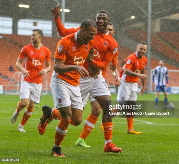 Blackpool's Kyle Vassell celebrates scoring his side's first goal with teammate Viv Solomon-Otabor during the Sky Bet League One match between...